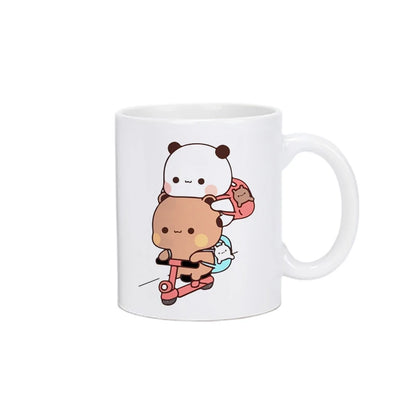 TAZAS DE CAFÉ CON DISEÑO DE OSO Y GATO.