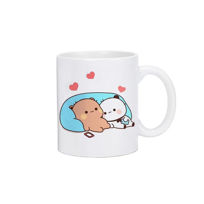 TAZAS DE CAFÉ CON DISEÑO DE OSO Y GATO.