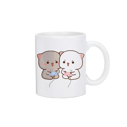 TAZAS DE CAFÉ CON DISEÑO DE OSO Y GATO.