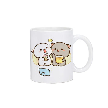 TAZAS DE CAFÉ CON DISEÑO DE OSO Y GATO.