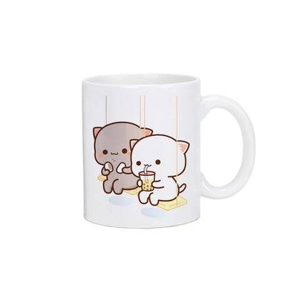 TAZAS DE CAFÉ CON DISEÑO DE OSO Y GATO.