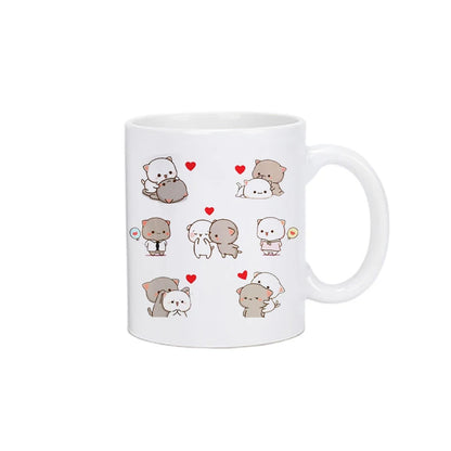 TAZAS DE CAFÉ CON DISEÑO DE OSO Y GATO.